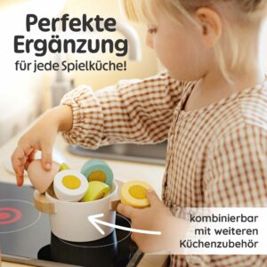 Kind spielt mit spielzeug Eiern aus Holz als perfekte Ergänzung für jede Kinderküche, nachhaltiges Kaufladen Zubehör Holz, Holzeier für Kinder ab 2–3–4 Jahren, spielerisches Lernen im Kaufmannsladen.