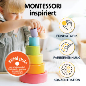 Montessori-inspiriertes Stapelspiel Holz: Kind baut einen bunten Stapelturm aus hochwertigen Stapelbechern aus Holz – fördert Feinmotorik, Konzentration und Farblernen; ideal als Stapelbecher Baby im becher stapel spiel.