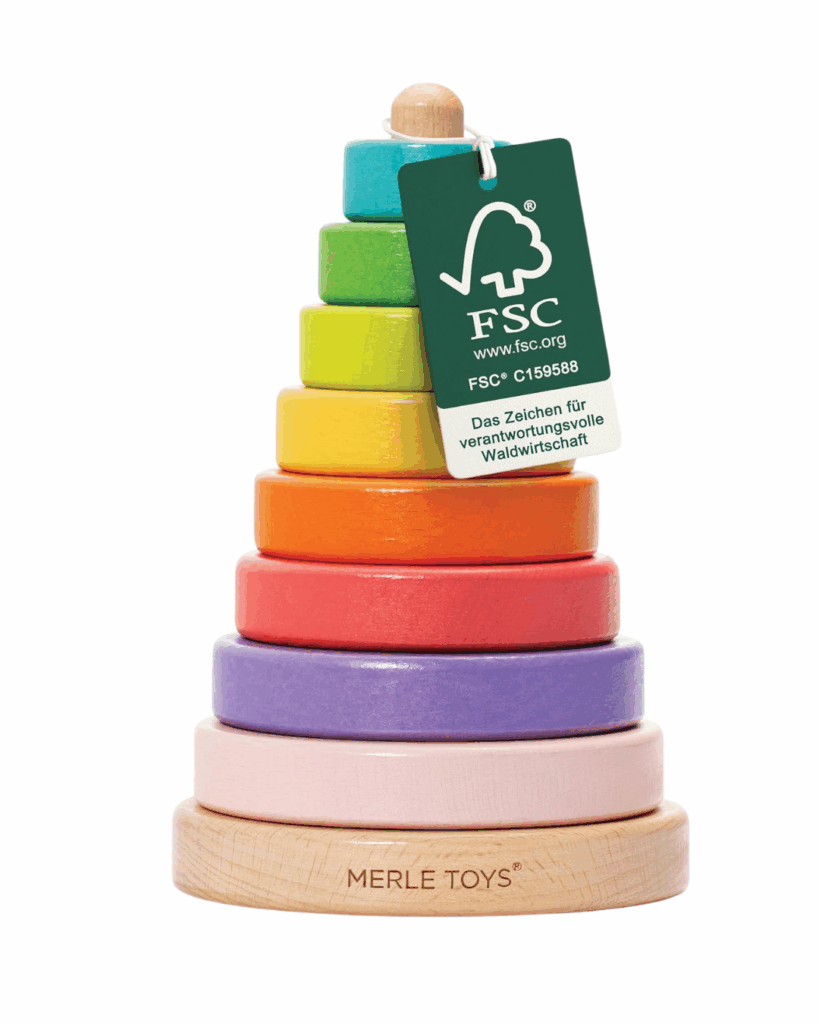 Geschenke für 1-Jährige – liebevoll Geschenke für Kleinkinder wie, Stapelbecher, Steckpuzzle und Babydecke in festlichen Weihnachtskugeln.